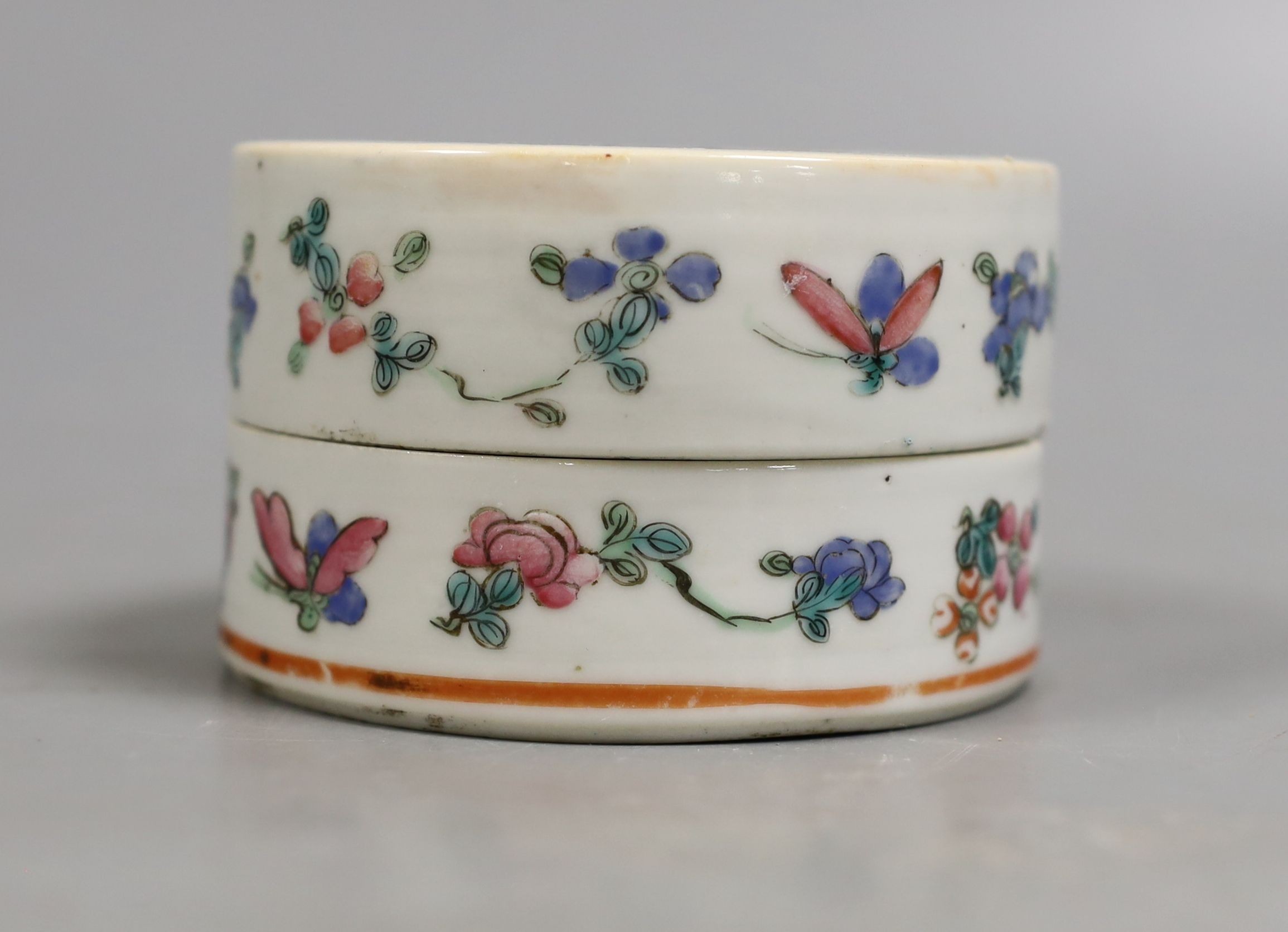 A 19th century Chinese famille rose box and cover, Liberty retail label, 9.5 cms diameter.